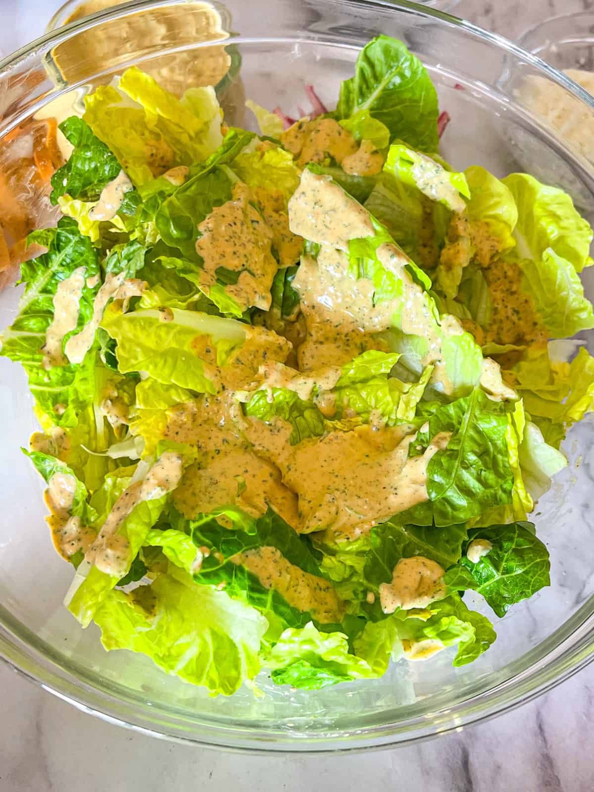 lettuce drizzled with Mexican caesar dressing.