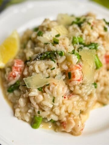 creamy langostino lobster risotto with asparagus and lemon.