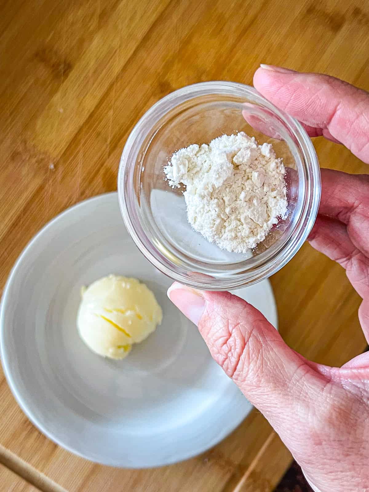 flour held over butter