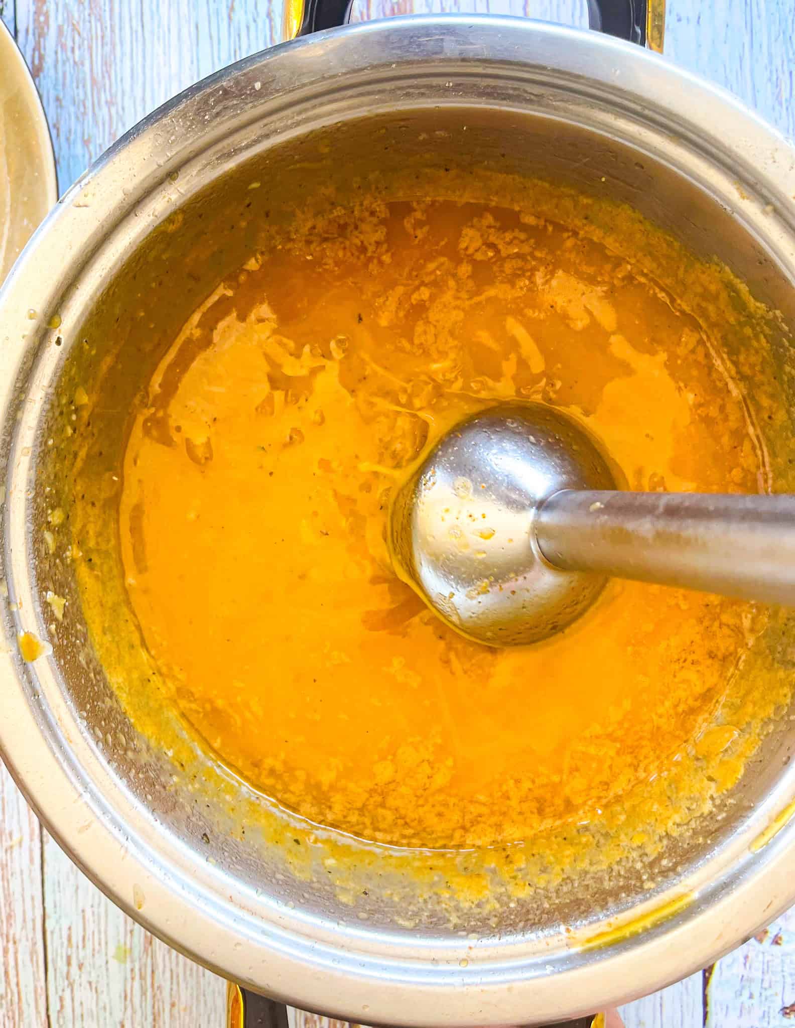 stick blender in the saucepan of cajun butter.