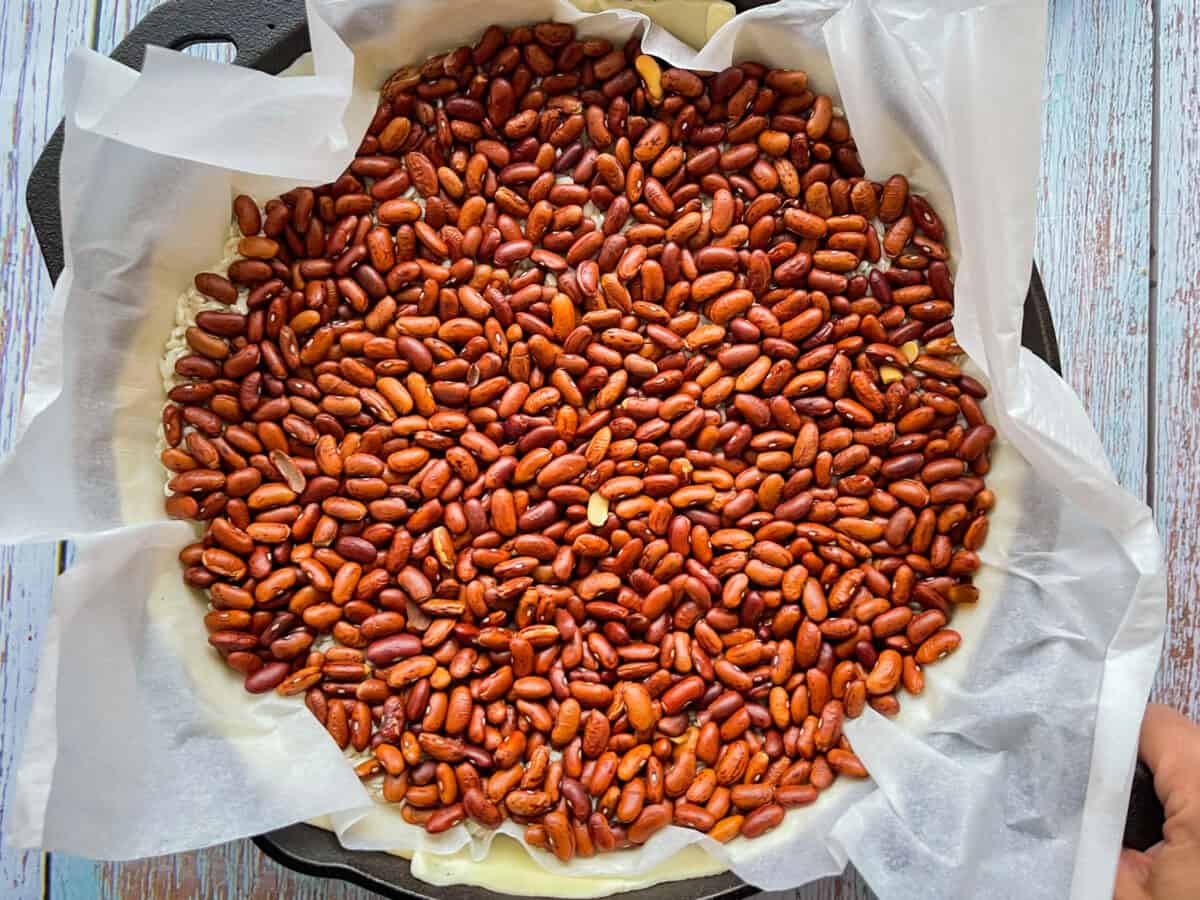 beans added to weigh down pie crust.
