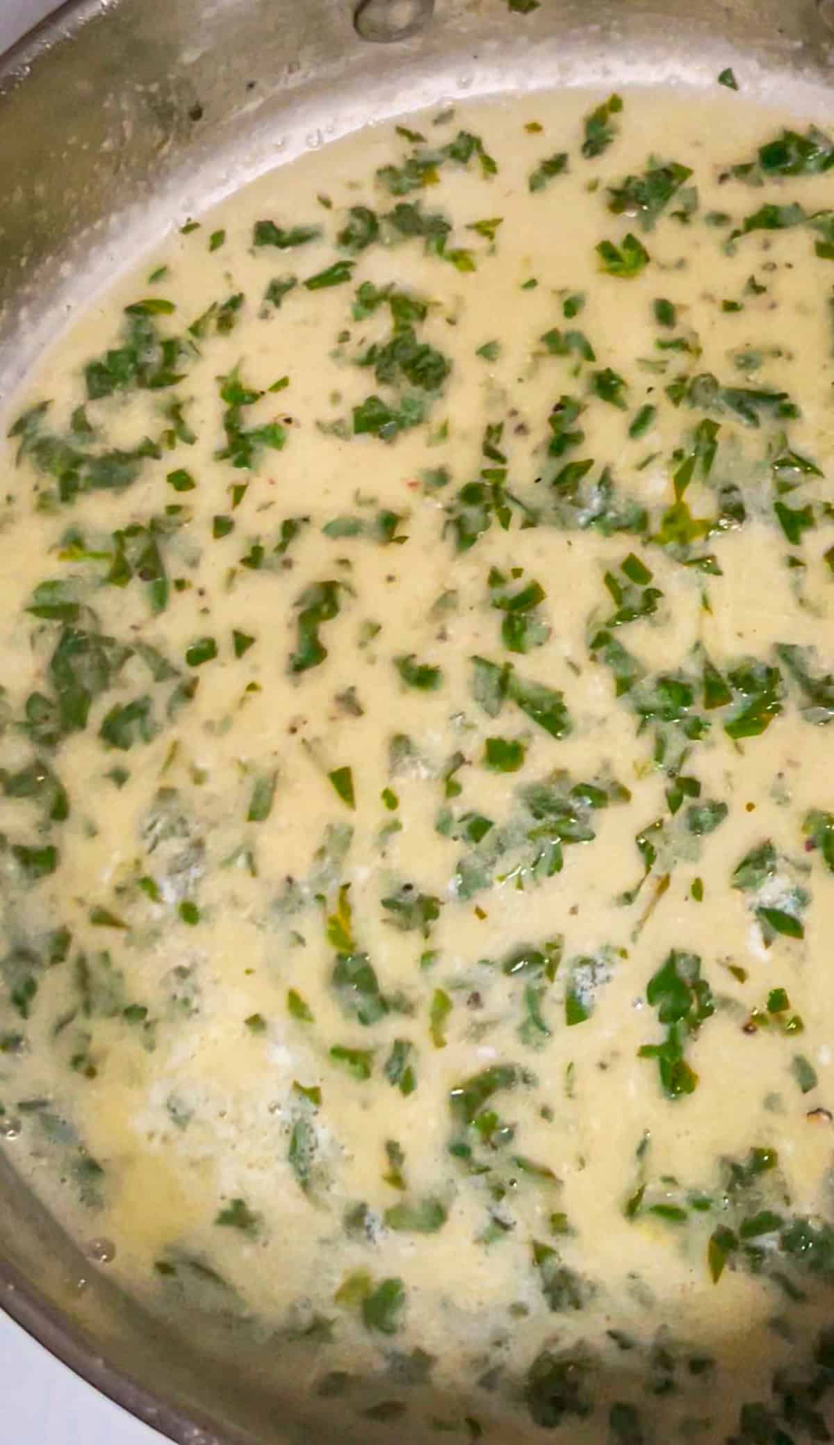 lemon butter herb sauce in the pan.