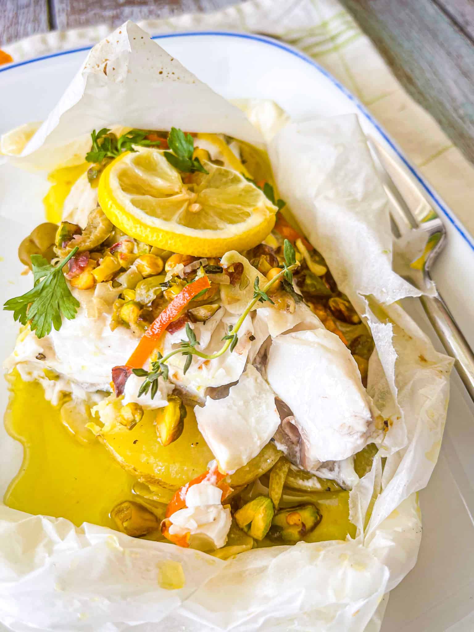 Easy Baked Grouper Packets with Citrus, Olives, and Pistachios