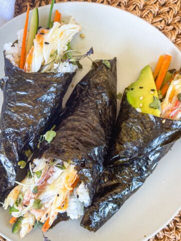 3 temaki rolls on a plate