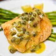 seared lemon butter sablefish served over asparagus.