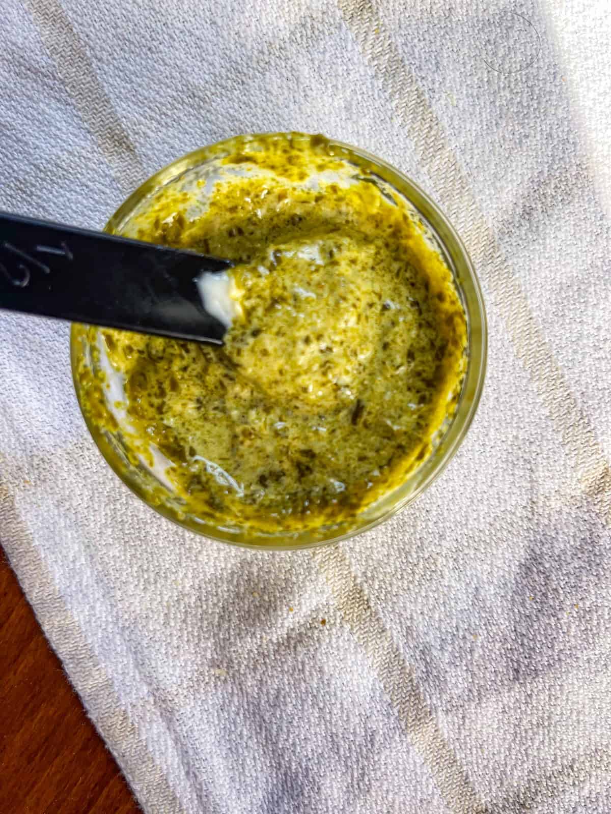 Pesto mayo mixed in a bowl.