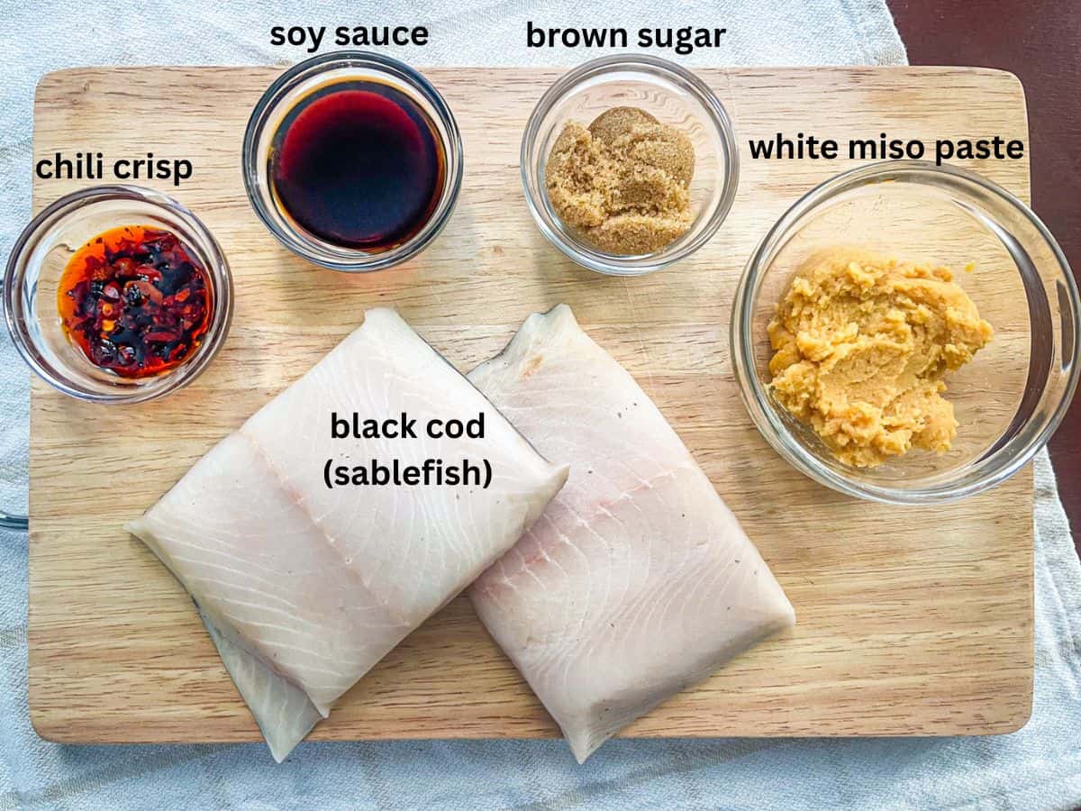 ingredients for air fryer cod recipe laid out on the counter and labeled.