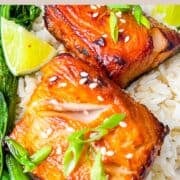 Miso Black Cods on a bed of rice and side of greens.