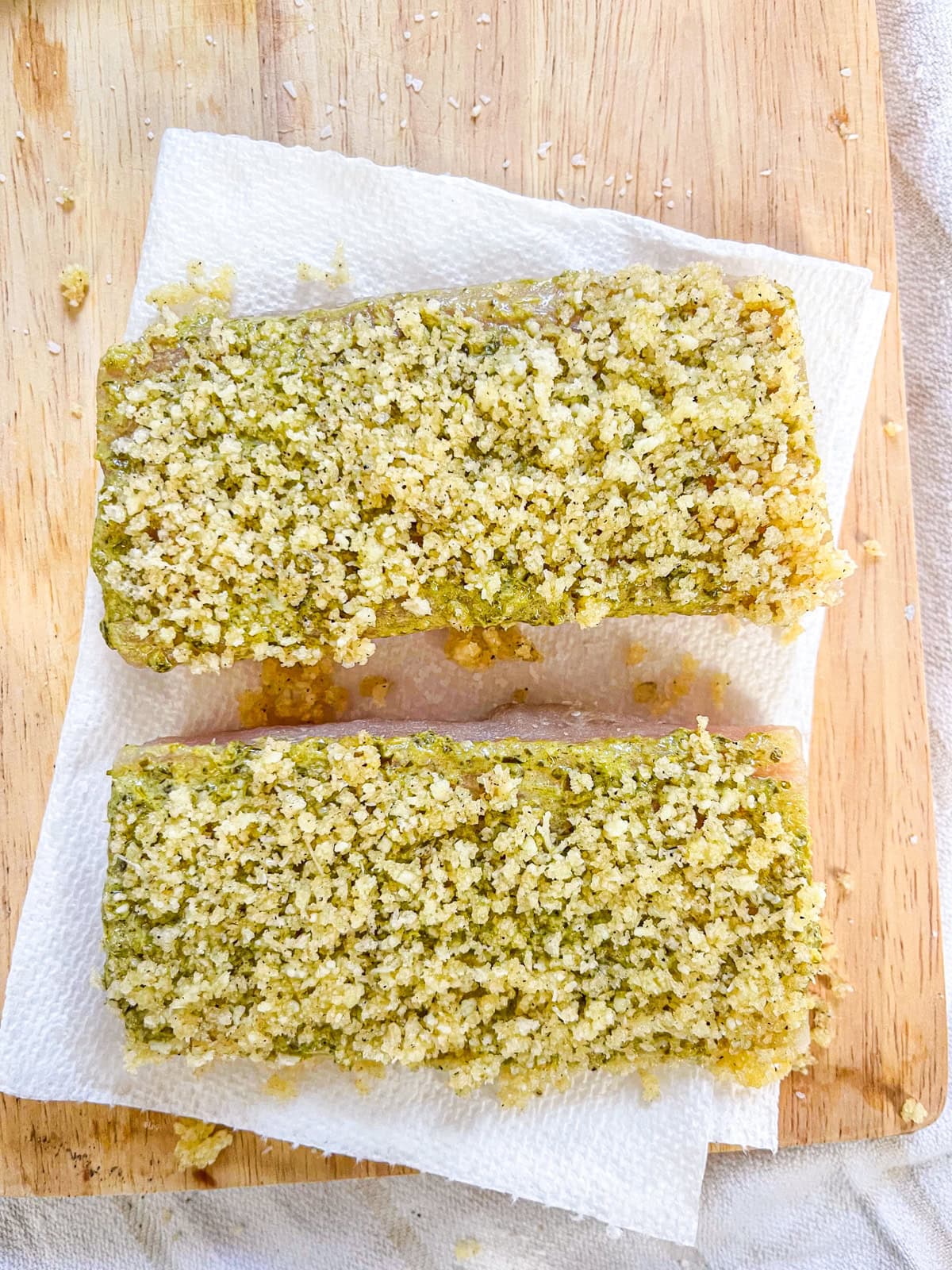 seasoned panko crumbs pressed onto fish.