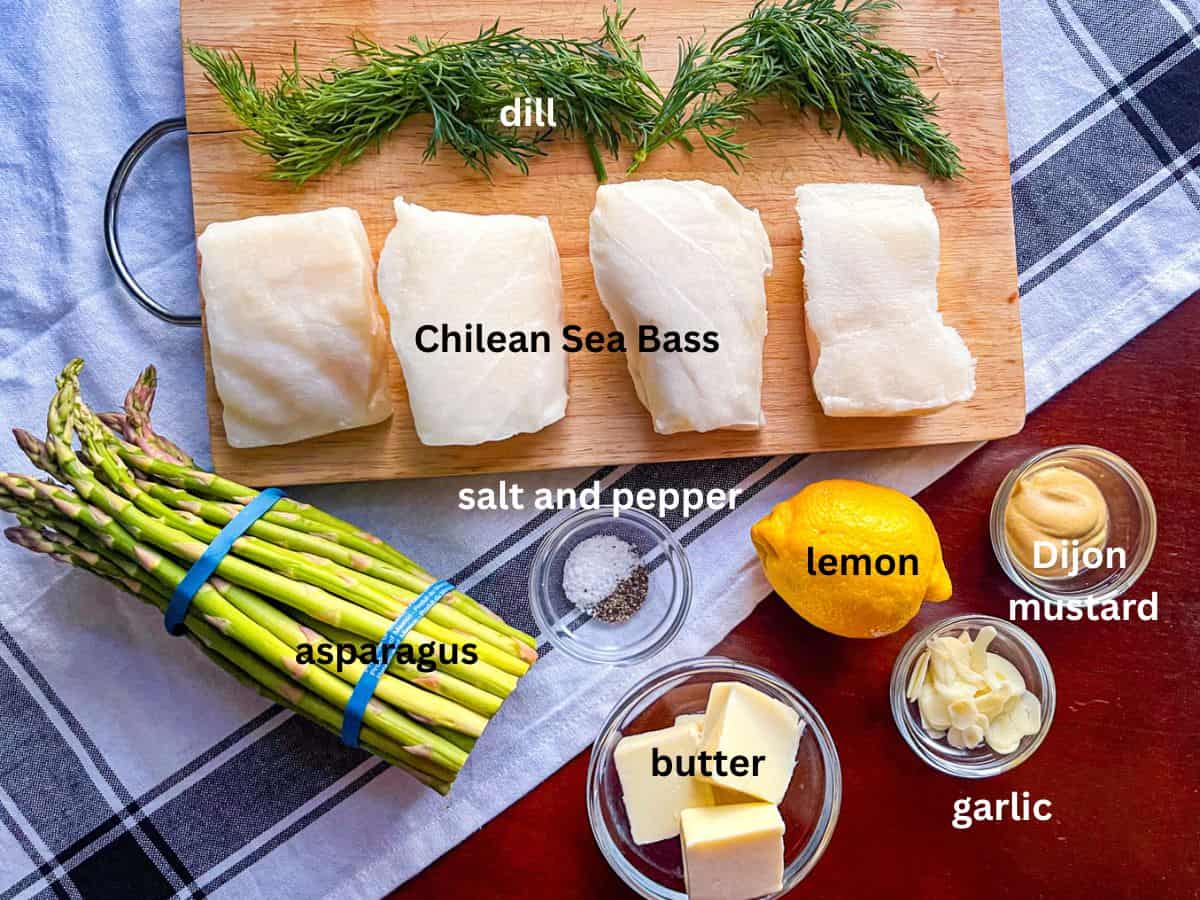 Ingredients for baked Chilean sea bass on a table.