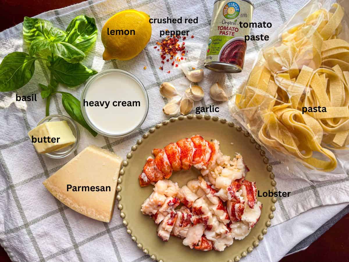 Ingredients for lobster pasta laid out on the table.