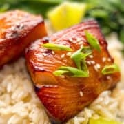 air fryer miso cod garnished with scallions and sesame seeds.