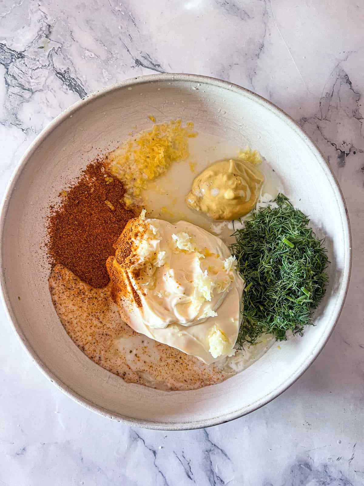ingredients for dressing in a bowl.