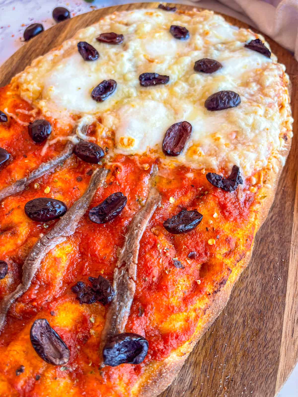 Pizza finish baking in the oven.