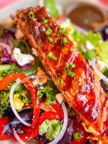 Grilled Salmon on a Salad.