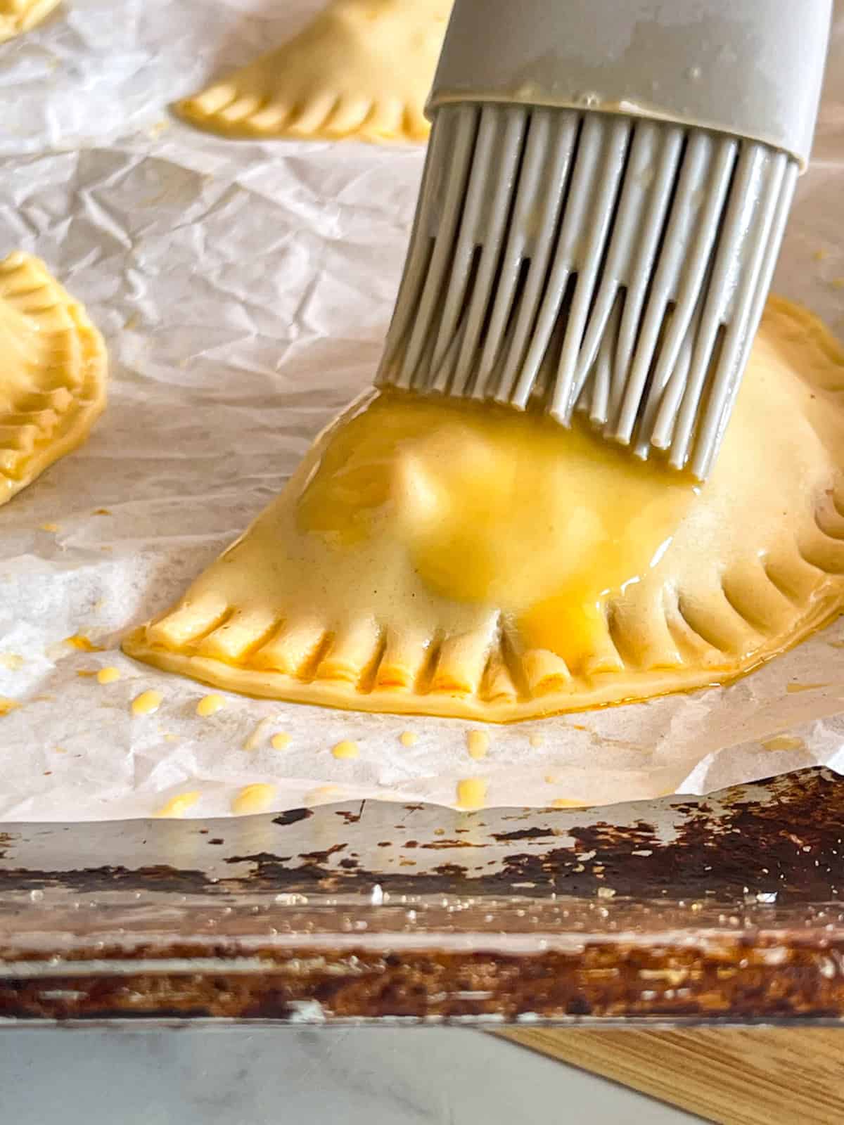 Brush your tuna pie with an egg wash for a glossy finish.