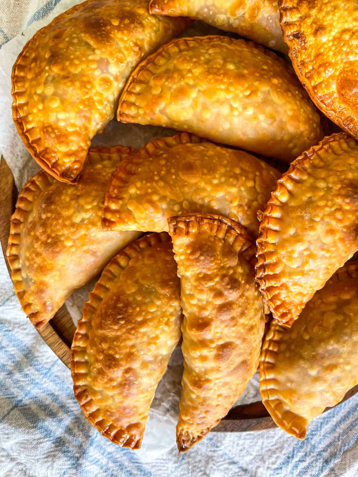 basket of crispy baked tuna hand pies.
