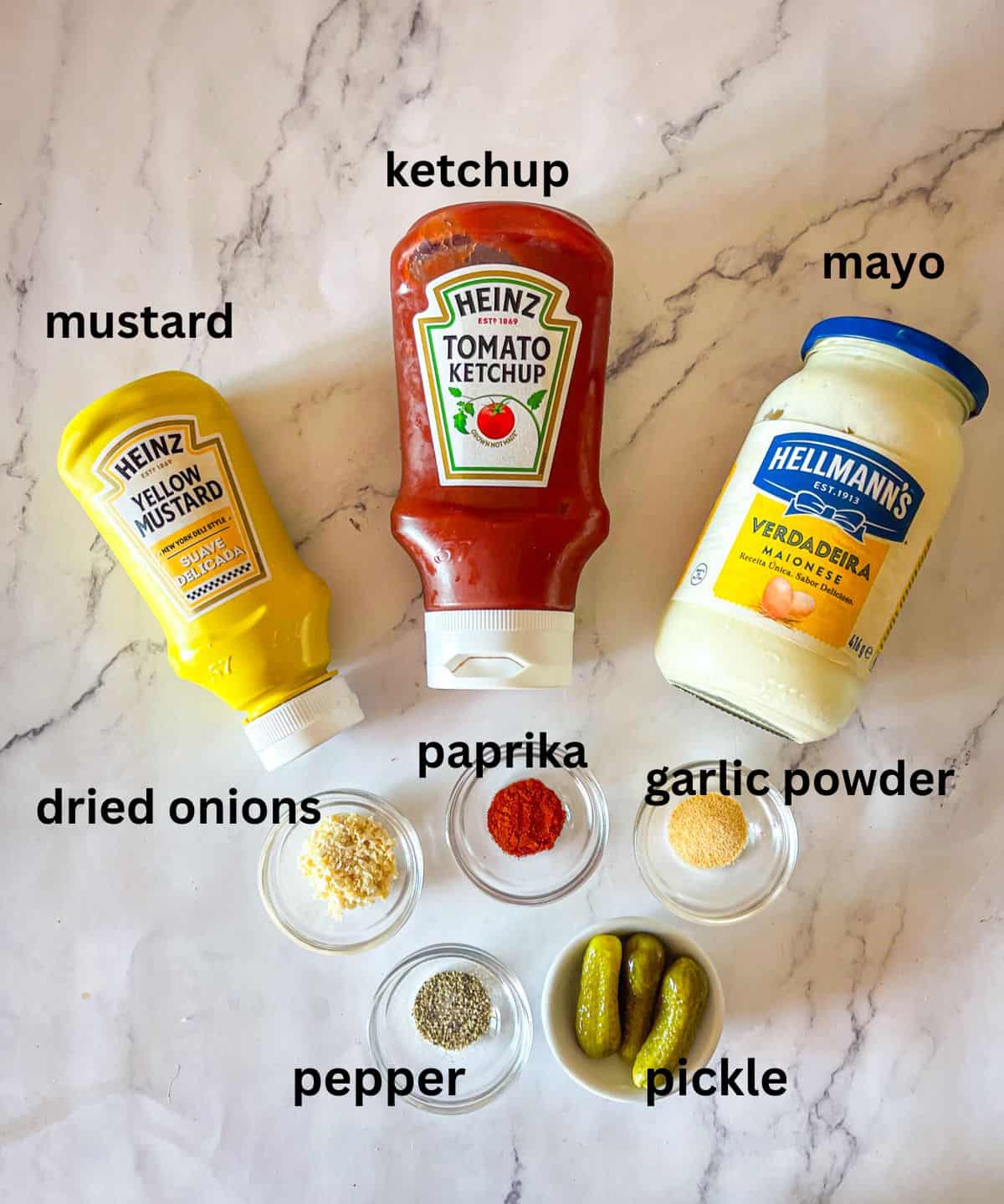 Ingredients for burger sauce on table.
