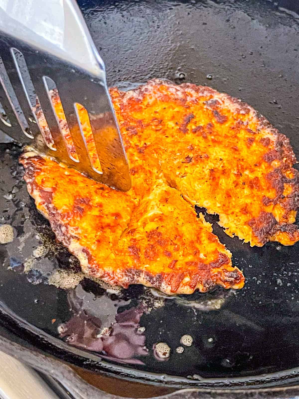 Salmon burger patties cut into pieces..