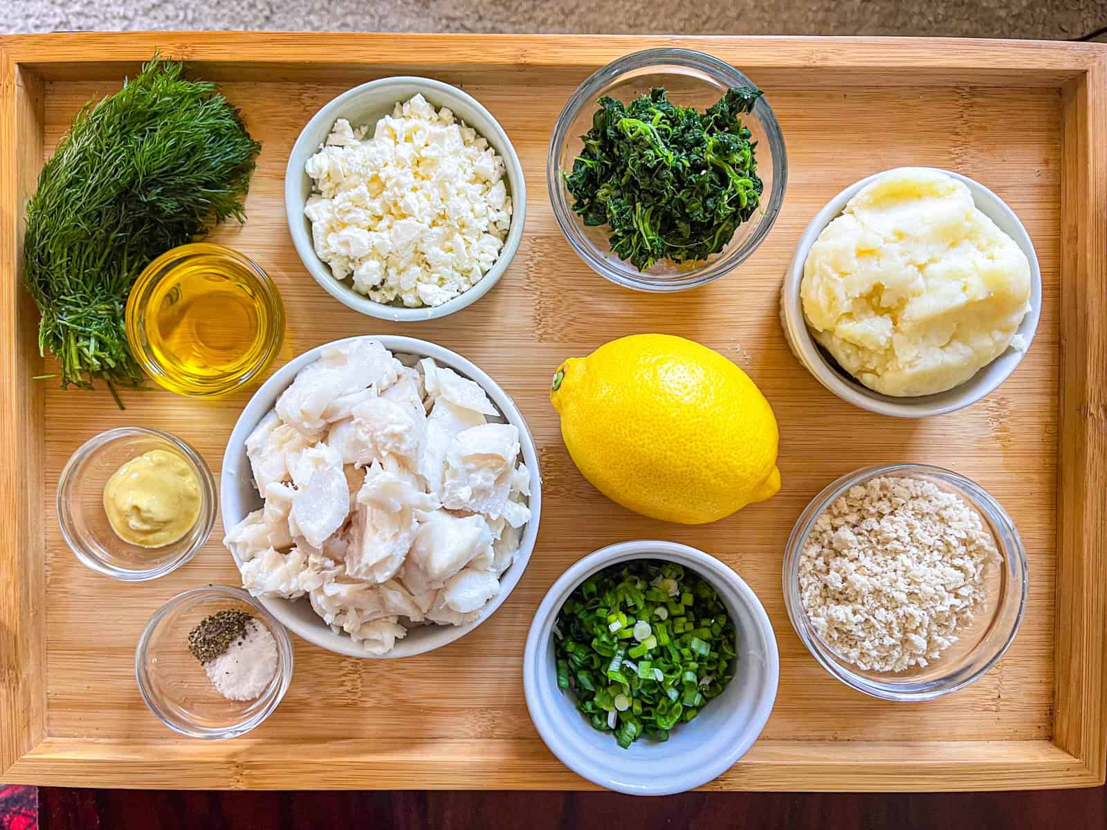 Ingredients for fish cake on a tray.