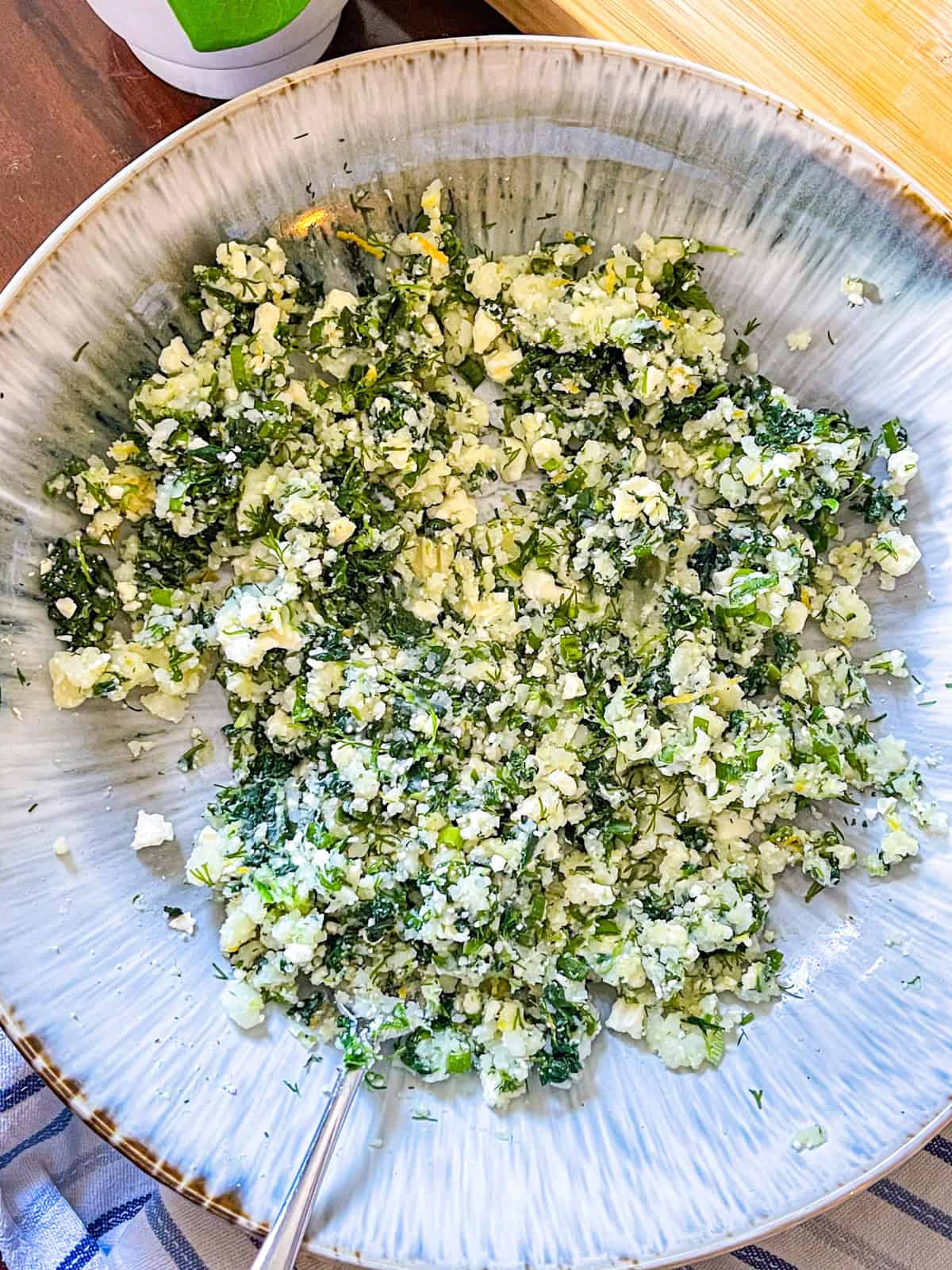 Ingredients for fish cake in a bowl.