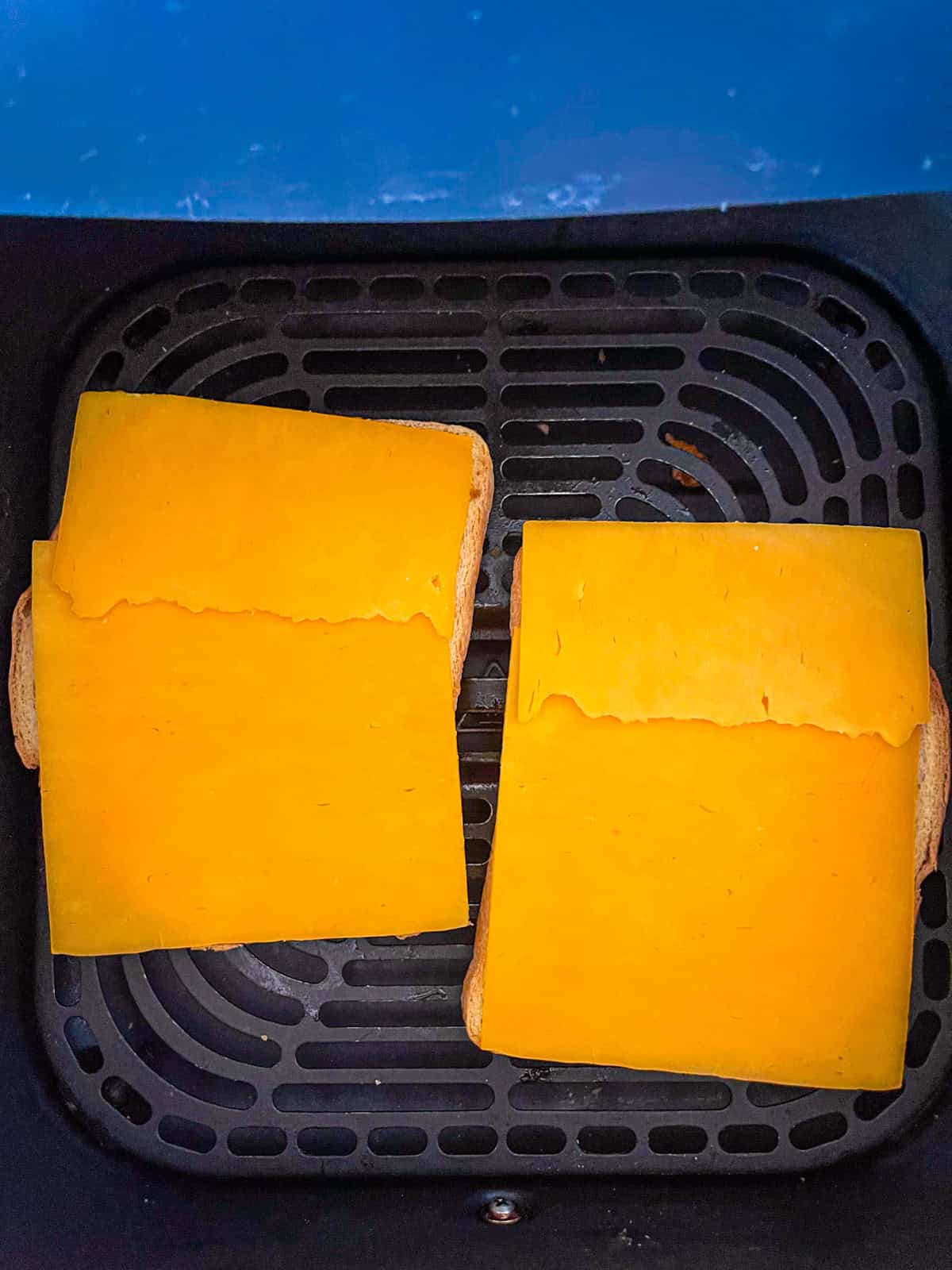 Bread with cheese in air fryer.