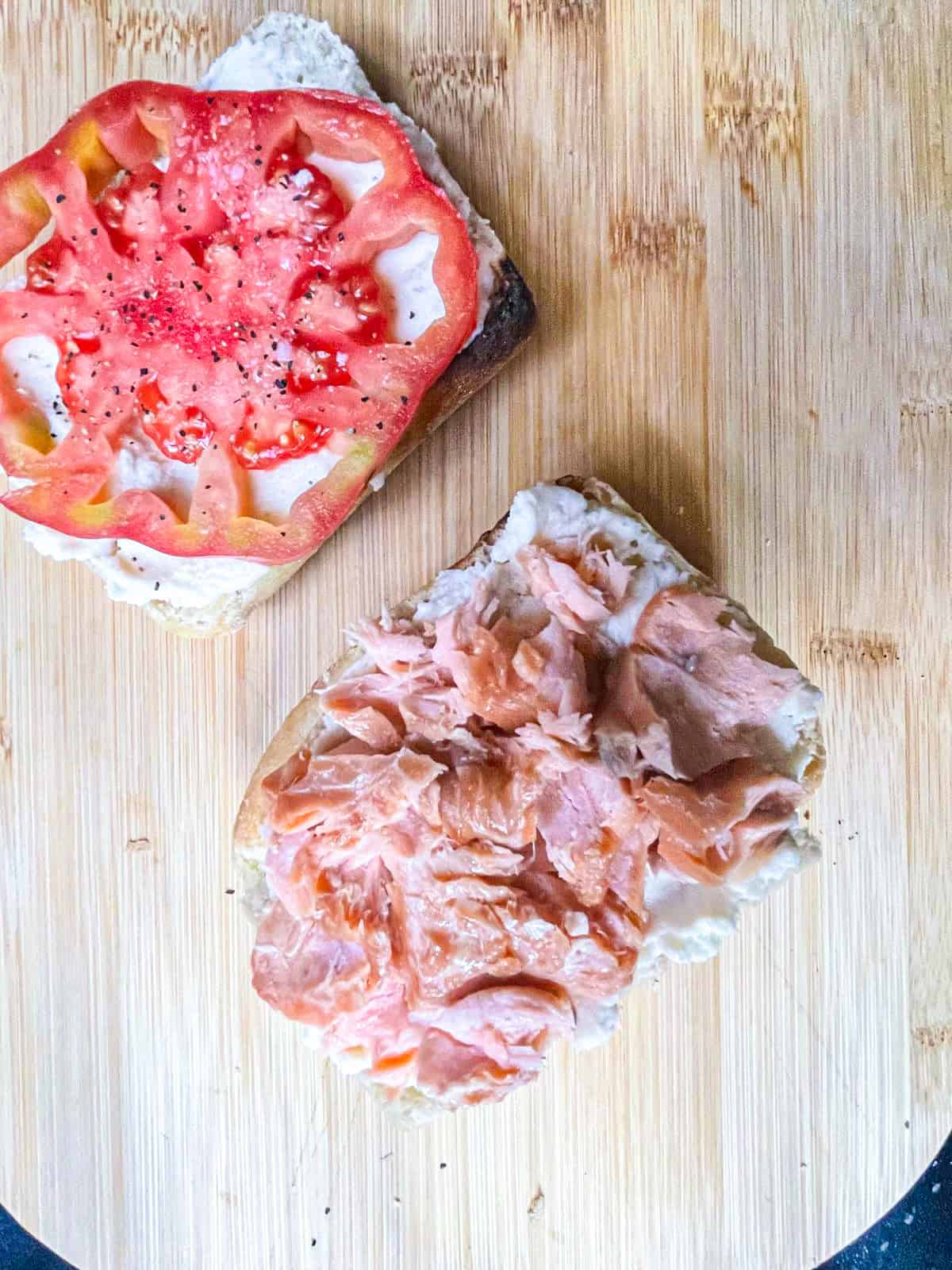tomato, smoked salmon and cream cheese spread over two slices of bread