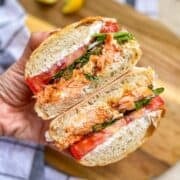 smoked salmon ricotta sandwich cut open and stacked.