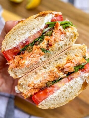 smoked salmon ricotta sandwich cut open and stacked.