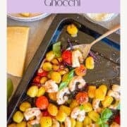 Sheet pan full of shrimp, gnocchi.
