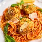 Air Fryer Scallops on a bed of marinara pasta.