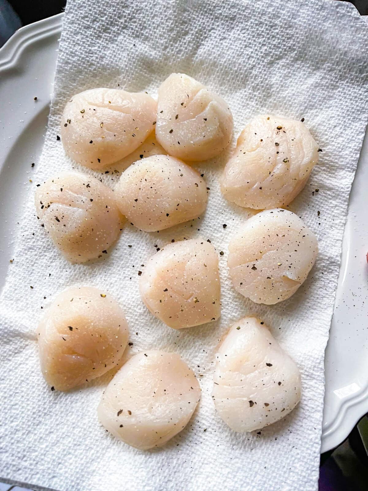 scallops seasoned on napkin.