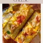 Lobster grilled cheese on a board.