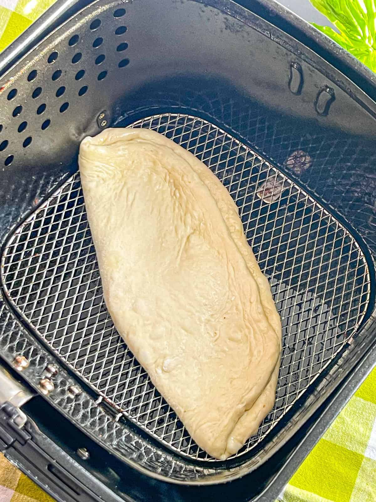 Dough placed in air fryer.