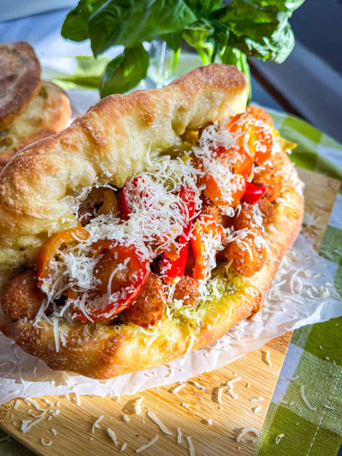 Shrimp parmesan sandwich on table.
