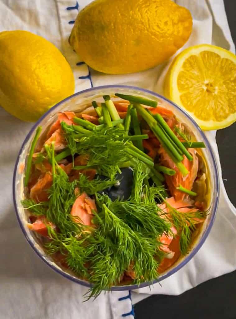 fresh dill and chives added to food processor bowl.