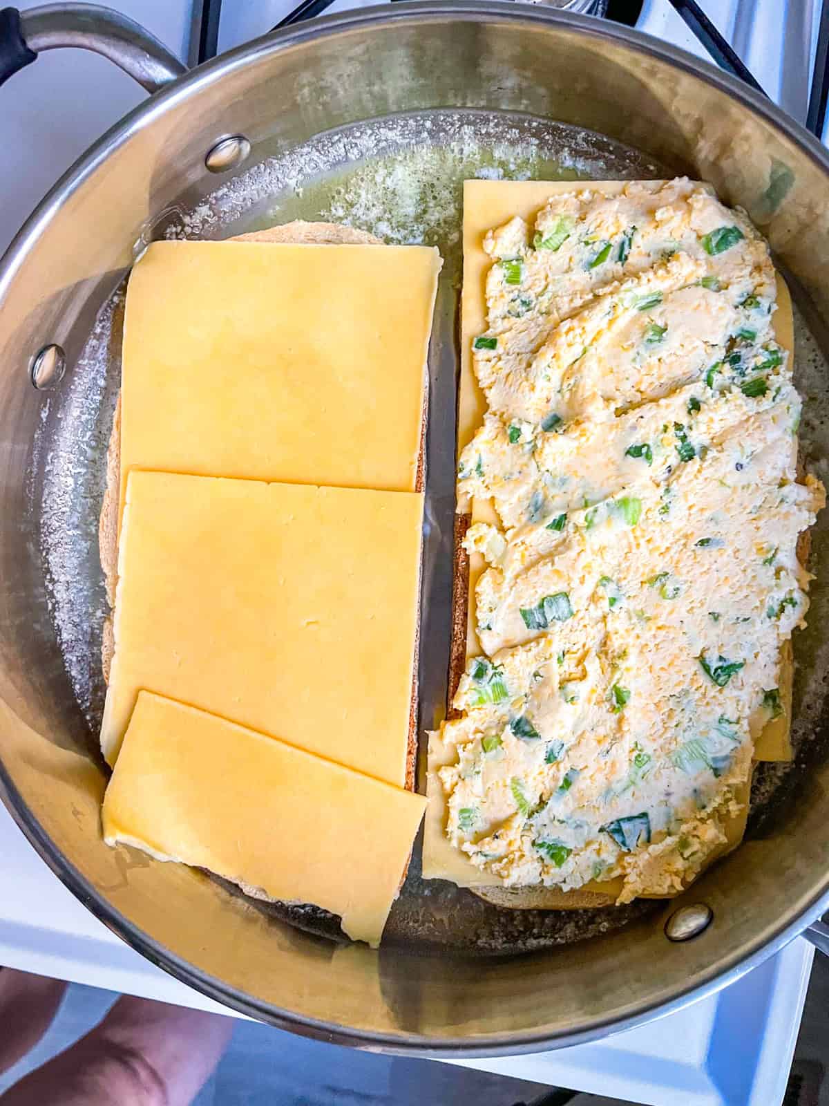 Cheesy mix and also gouda cheese laid out on two sourdough bread.