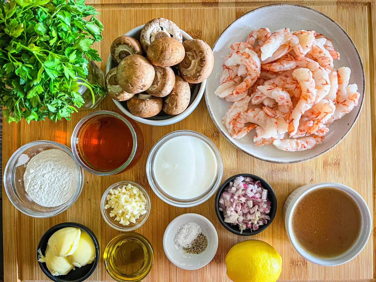 Ingredients for Shrimp Marsala Pasta on a table.