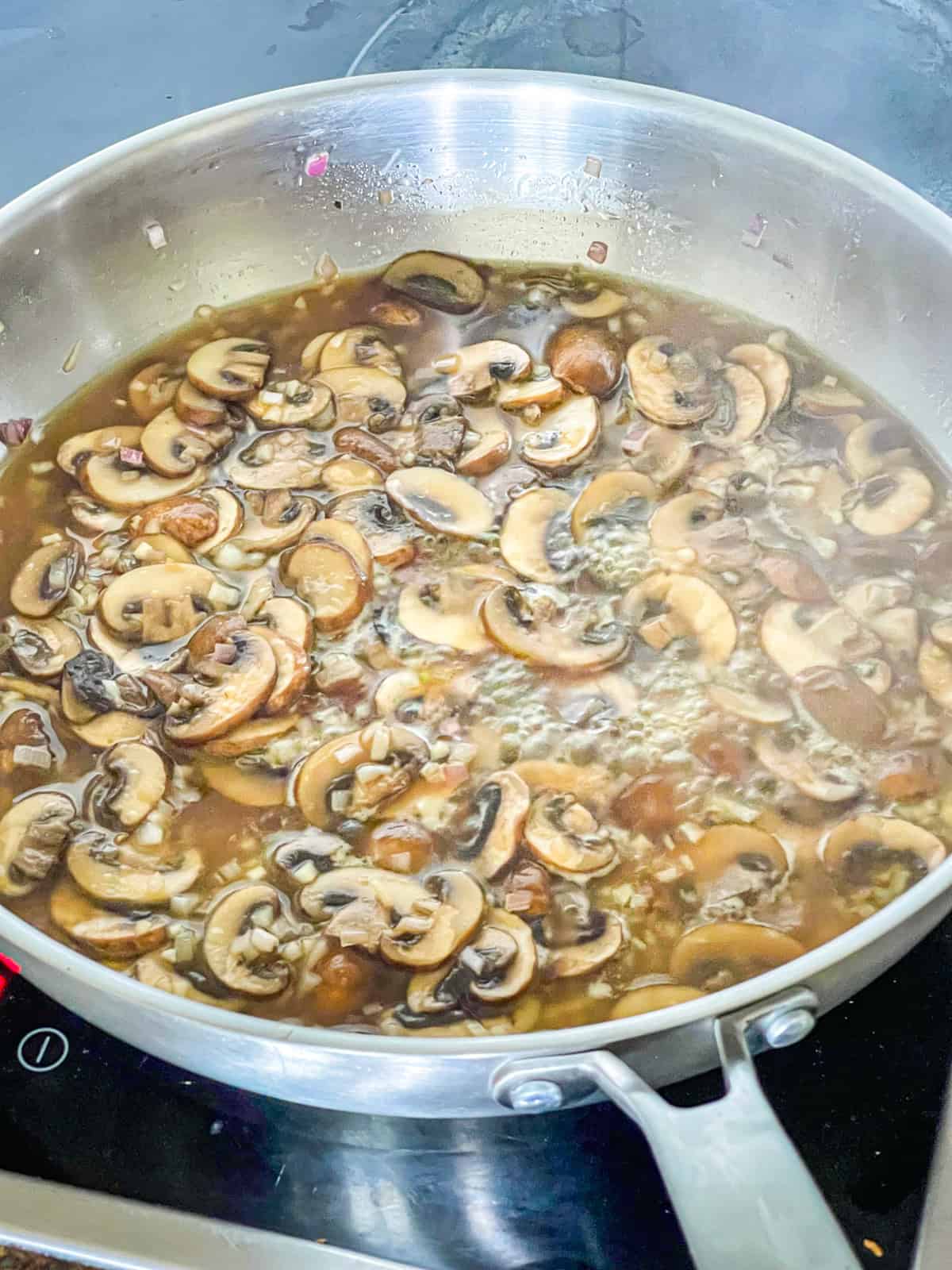 Mushrooms and marsala wine cooking