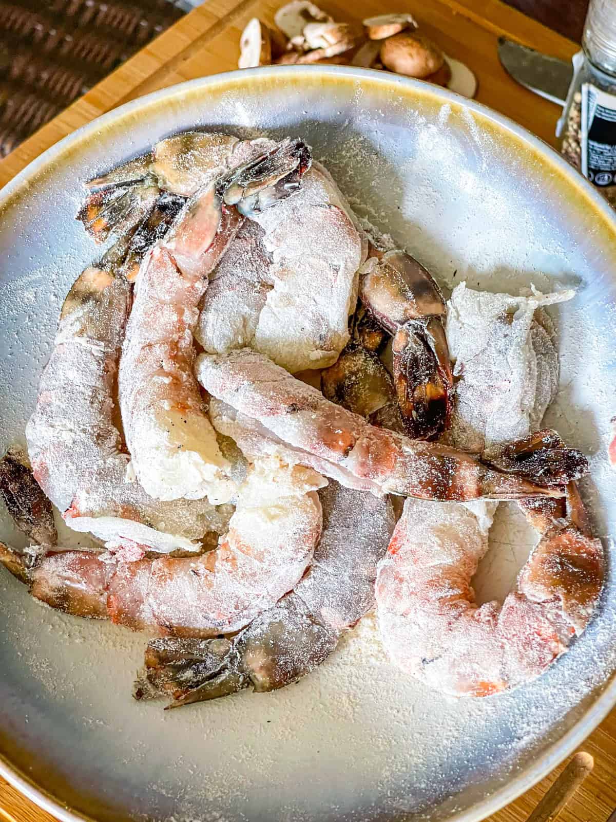 Coated shrimp a in bowl.