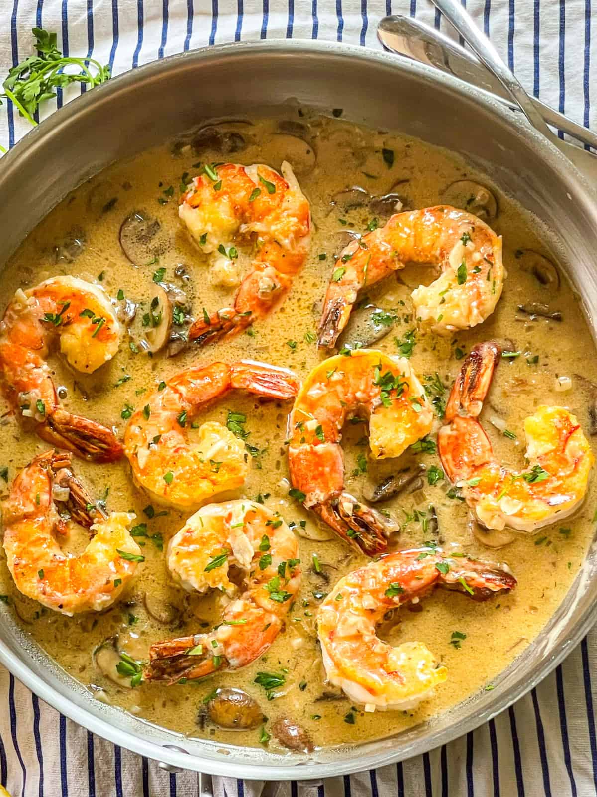 Shrimp Marsala in a skillet.