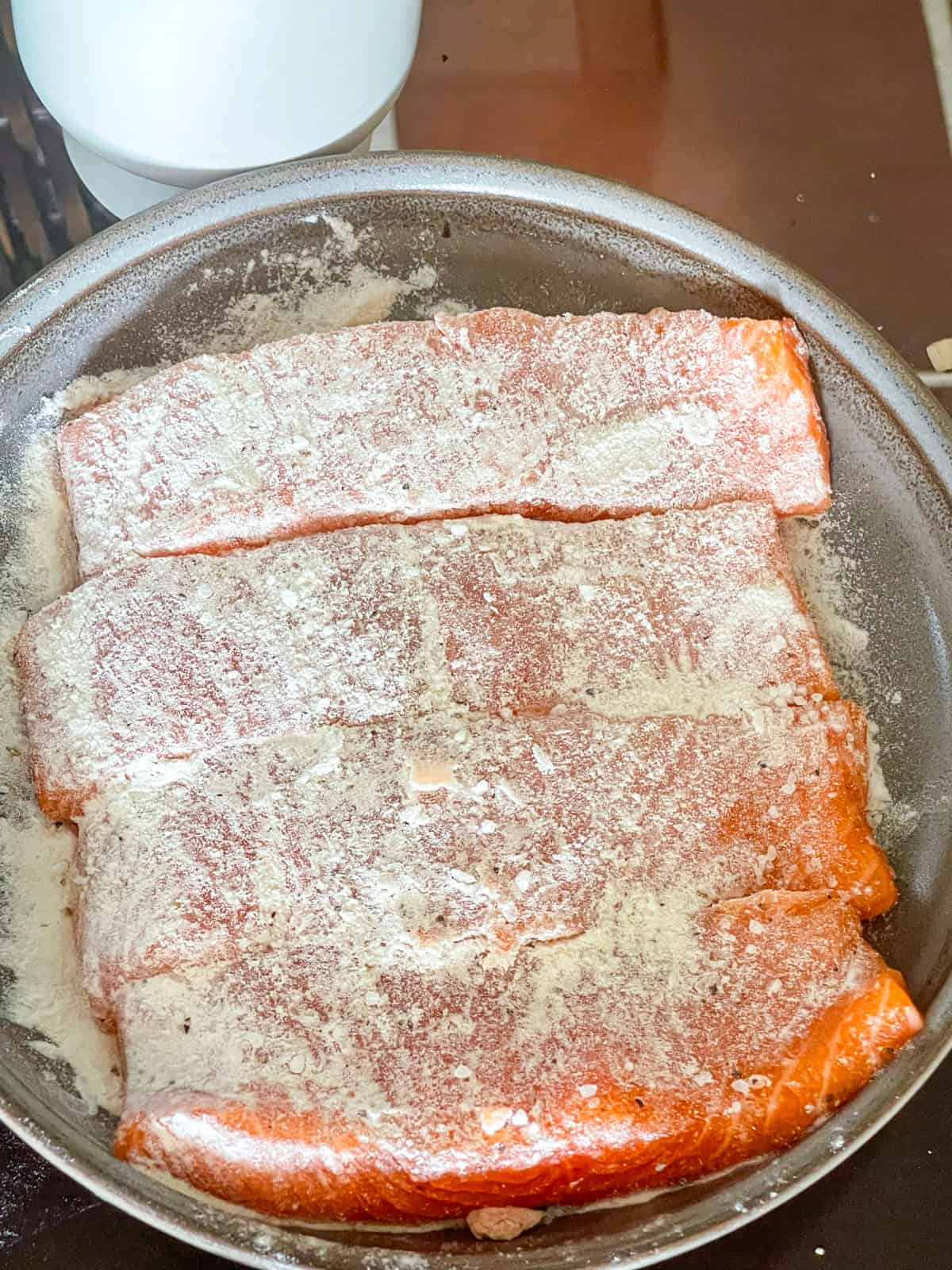 Salmon seasoned with wondra flour.