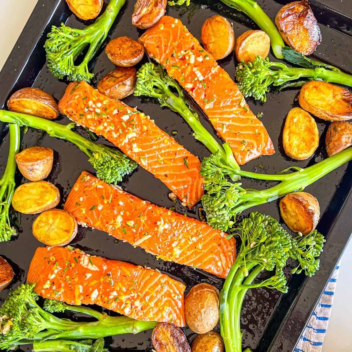 Marinated Salmon Recipe on a sheet pan ready to bake.