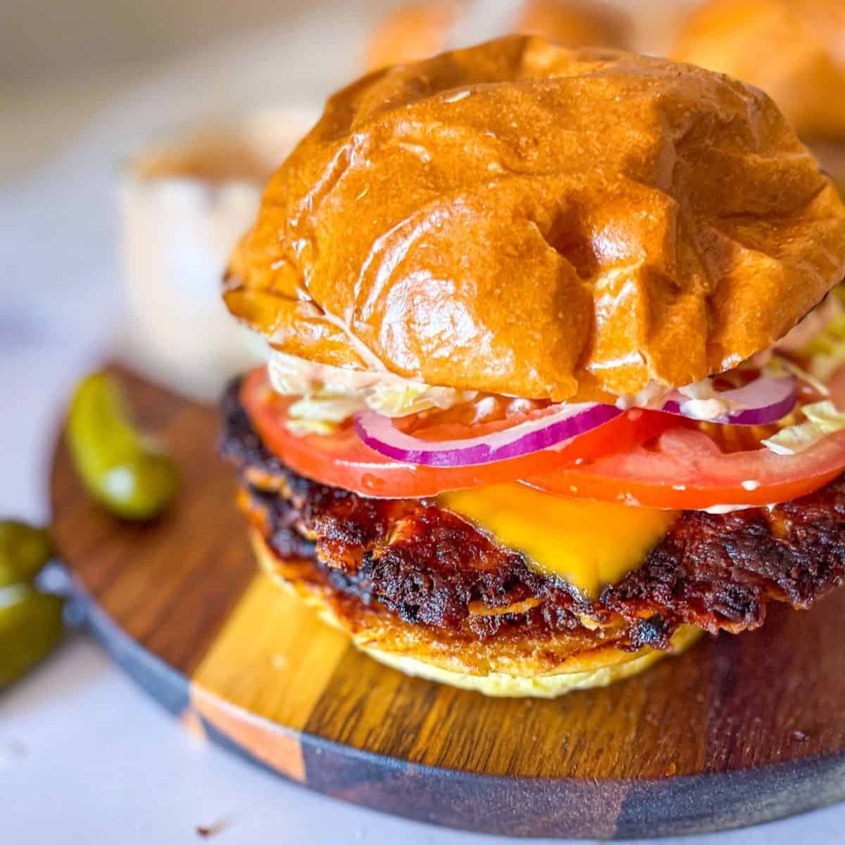 Canned Salmon Burger on a brioche bun with all the toppings.
