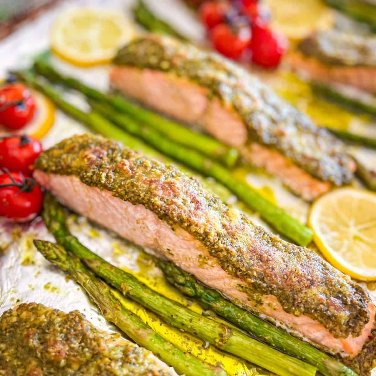 Pesto Salmon on sheet pan with asparagus.
