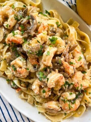 Shrimp marsala pasta on a platter.