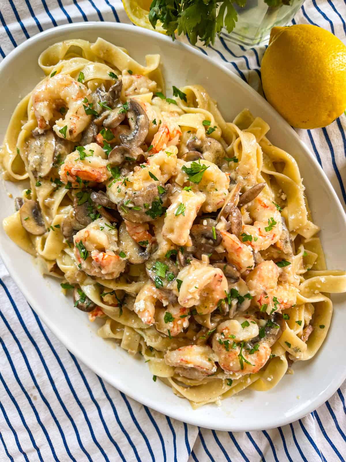 Shrimp Marsala pasta on a platter.