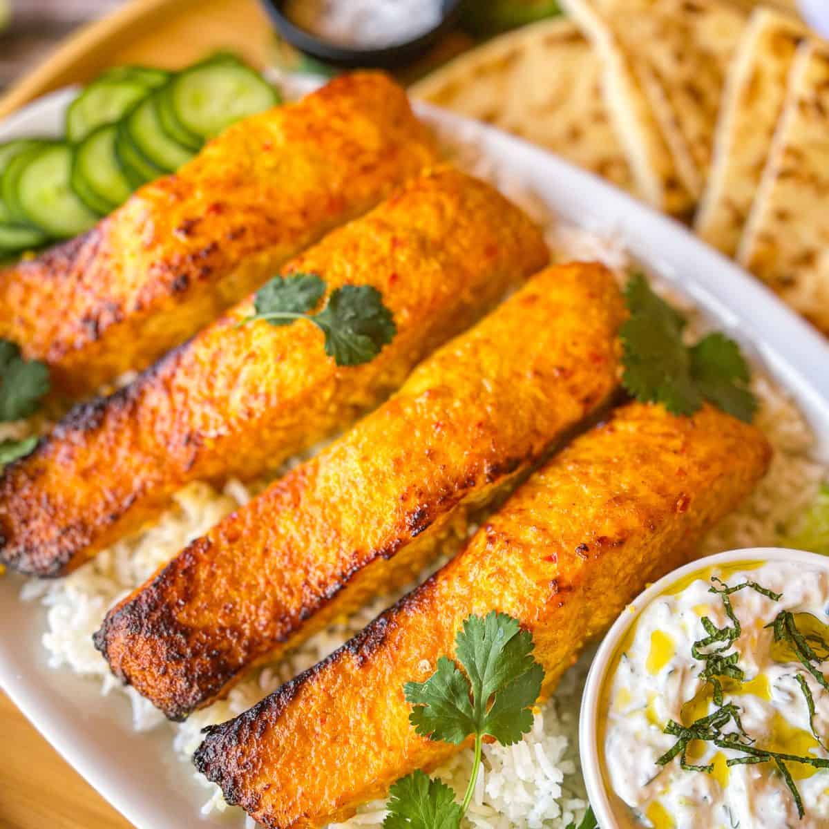 Easy Indian Spiced Baked Salmon Recipe over rice.