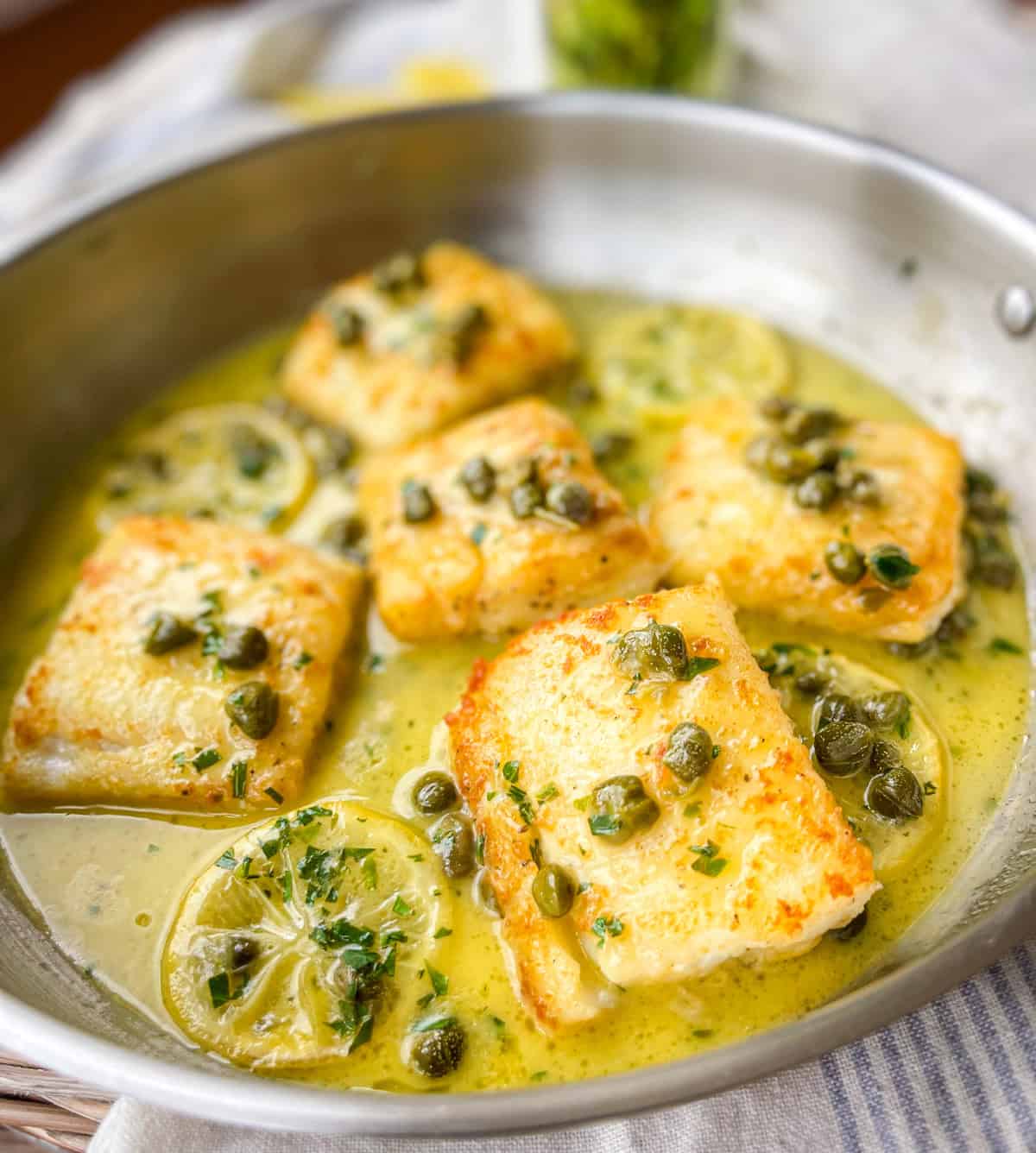 Cod Piccata in a pan.