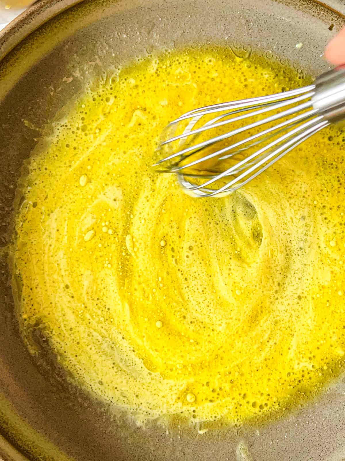 dijon mustard sauce mixed in a bowl.